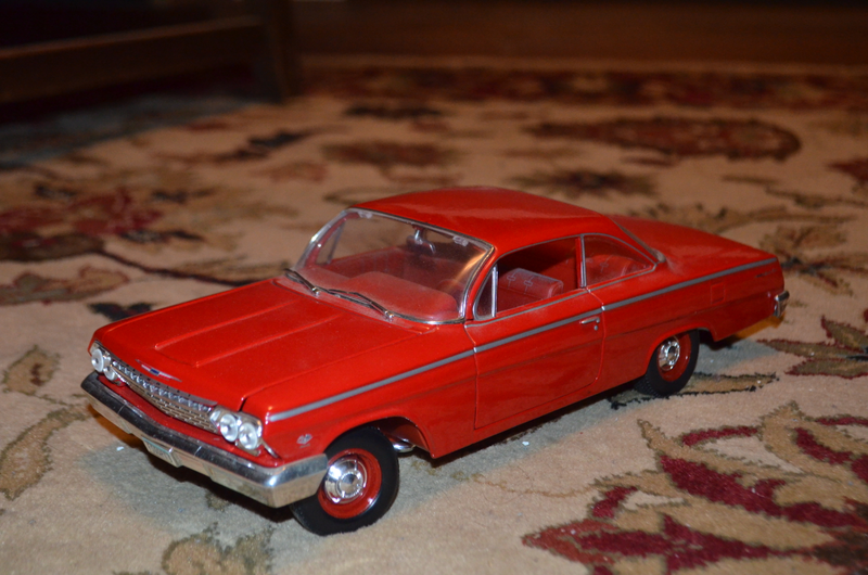 1/18 ‘62 Chevy Impala 409. No obvious issues besides dust.